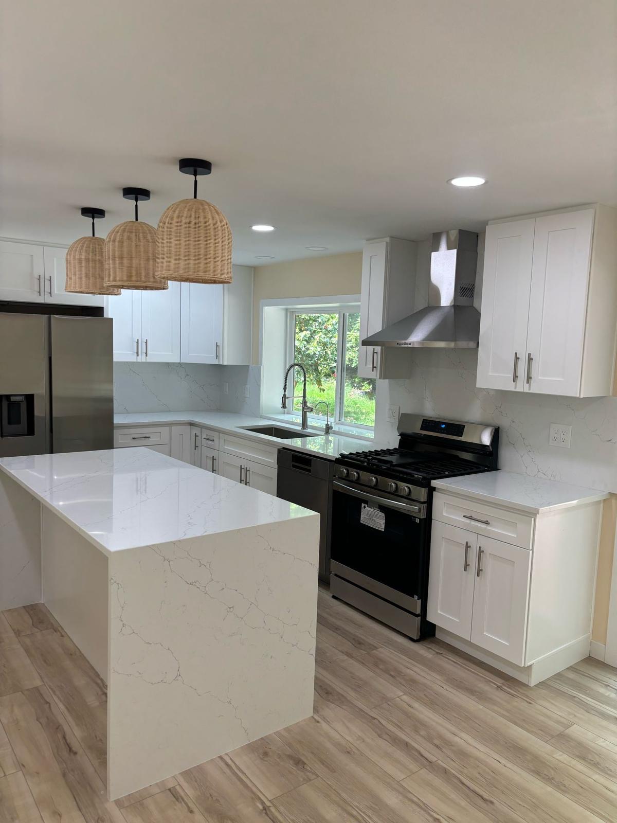 Kitchen countertop and backsplash installation with modern tile work in Seattle home
